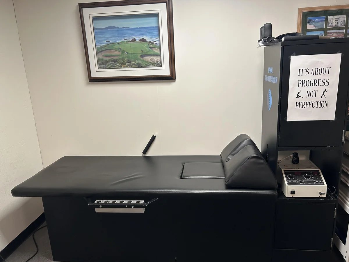 The spinal decompression table and traction unit in the treatment room at Tropea Chiropractic in Sunnyvale